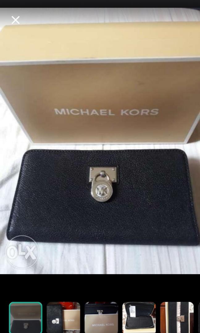 Michael Korrs (Category: Luxury Bags & Wallets) located in Binangonan. Submitted by anjiscloset (Listing ID 1005290968, Image 1). Description: authentic pure leather all zipped wallet,black in color,brand new.
