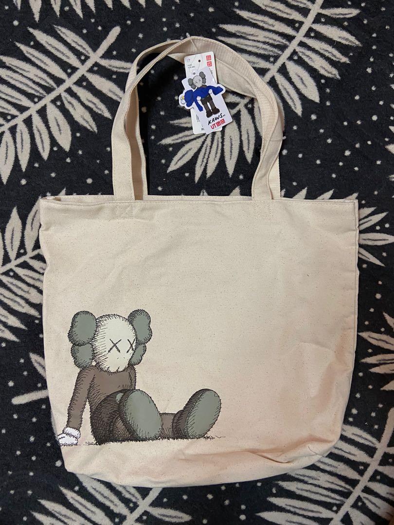 Uniqlo x Kaws tote bag Men s Fashion Bags Sling Bags on Carousell