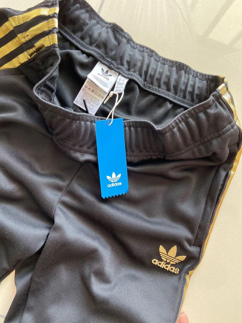 Adidas originals cuffed sale denim blue jeans
