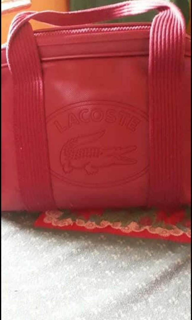 Authentic Lacoste Bag (Category: Tote Bags) located in Calamba. Submitted by mel013 (Listing ID 1010402282, Image 3). Description: selling my lacoste bag barely used excellent used condition.