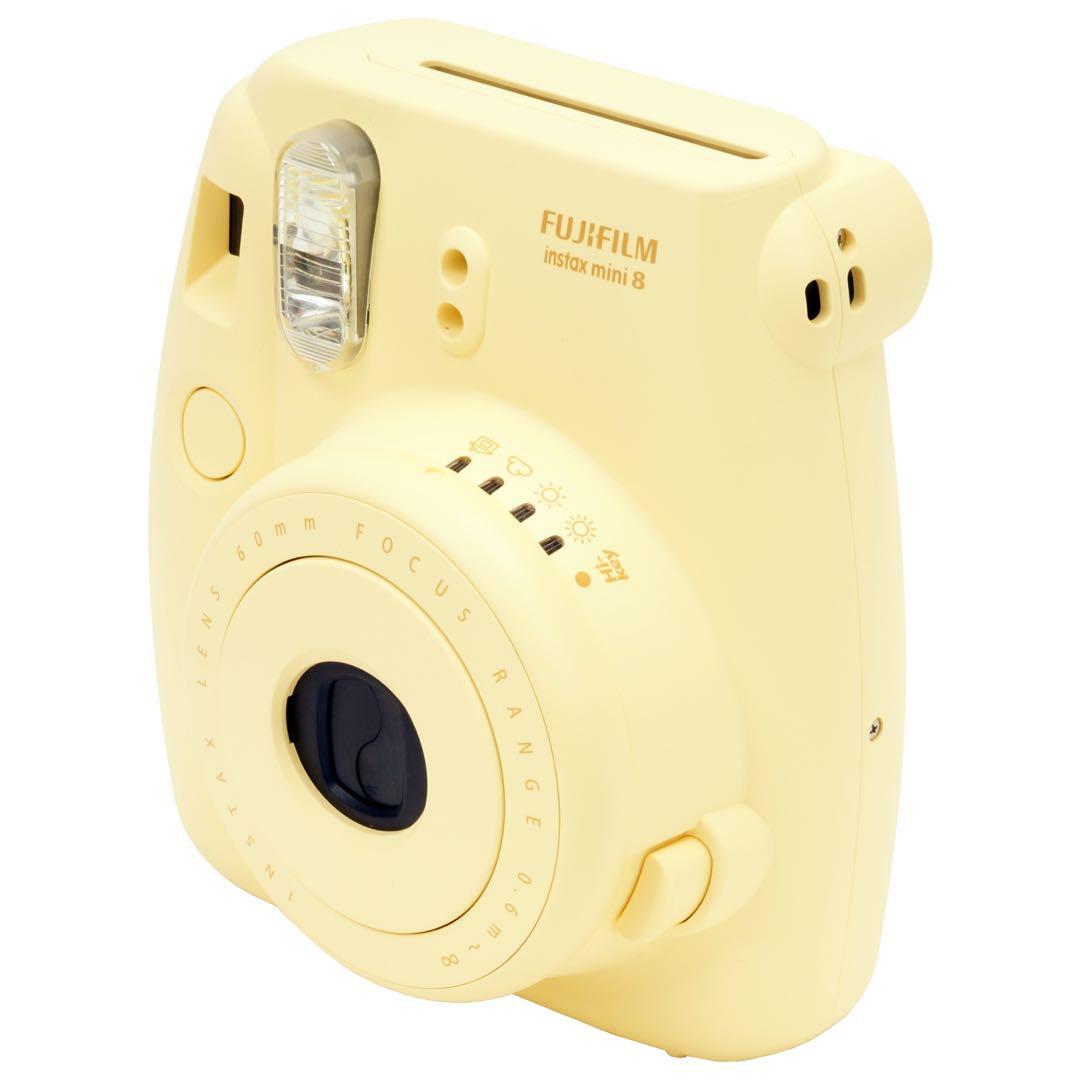 yellow polaroid camera