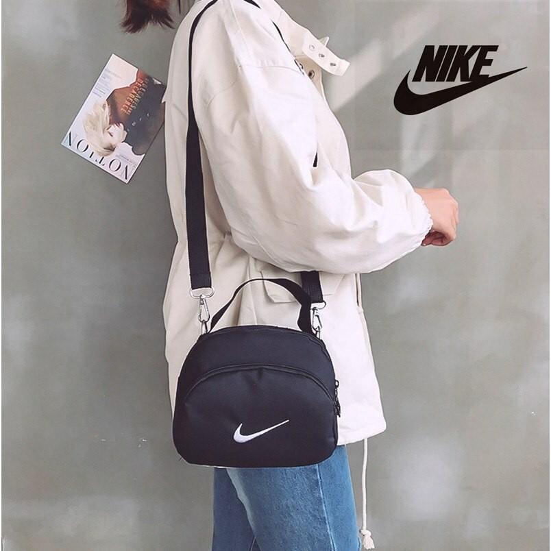 Nike mini sling bags, Women&#39;s Fashion, Bags & Wallets, Sling Bags on Carousell