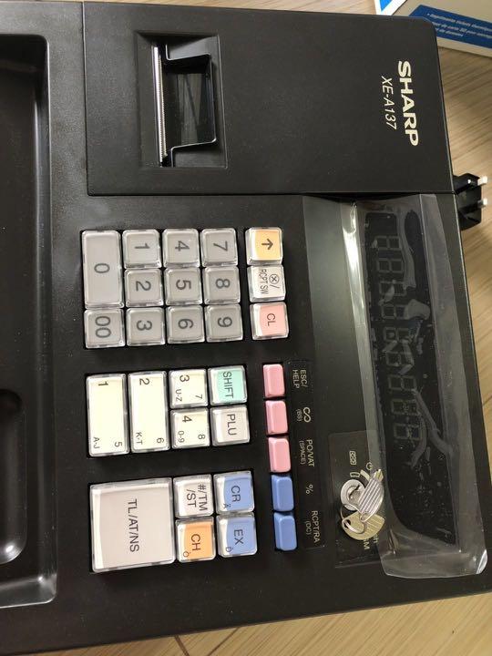 sharp cashier machine