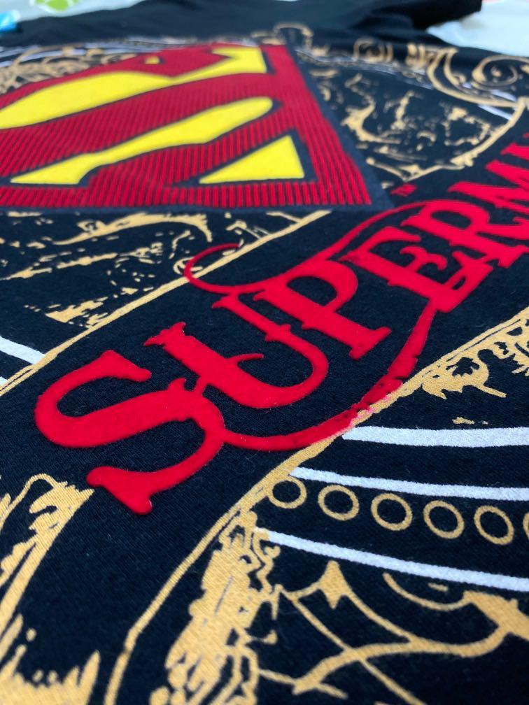 Superman Tee (Category: Tshirts & Polo Shirts) located in Singapore. Submitted by leon_lim (Listing ID 1010420195, Image 2). Description: BN intricately designed superman tshirt with a very unique print not found anywhere else. The Superman words and logo is raised velvet print. The logo at the back isn’t chipped but is the exact design as the Superman words on the front but the velvet behind is cracking a little bit but otherwise still in really