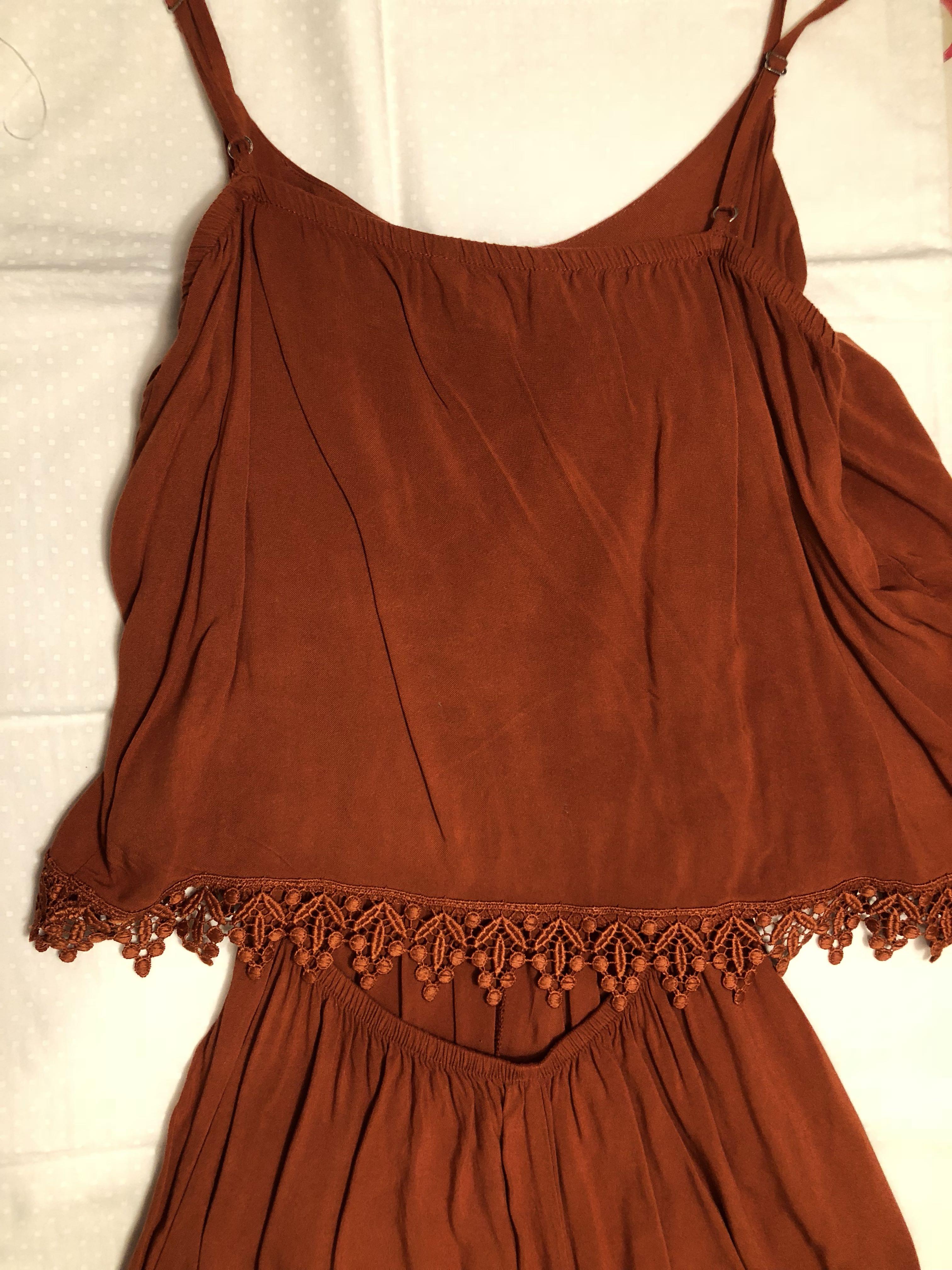 Burnt Orange Lace Trimmed Romper (Category: Rompers) located in Taguig. Submitted by prebyalle (Listing ID 1012656725, Image 2). Description: DETAILS super nice material and color! great quality. size: fits xs to m rfs: decluttering my height: 5’4 my size: 4-6 mop: bdo or cod shipping: grab unless not in manila shouldered by buyer pm for more questions! no lowballers please! helping tags: forever21 cottonon stradivarius hnm topshop.