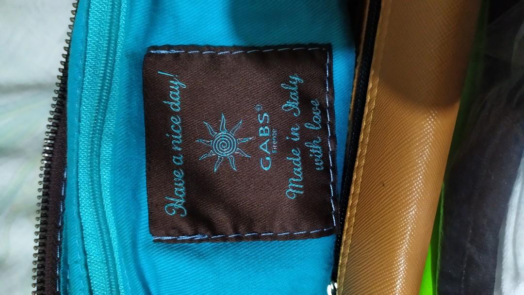 GABS Bag (Category: Shoulder Bags) located in Quezon City. Submitted by vintage_retroplus (Listing ID 1012513836, Image 2). Description: WITH FLAWS Pre Loved Gabs Firenze AQUA Bag Material - Genuine Leather , Wear and Tear Needs Spa All zippers and clasps working Size: Top - 17” Bottom - 17” Depth - 14” Bottom - 17” x 1” RARE MADE IN ITALY.