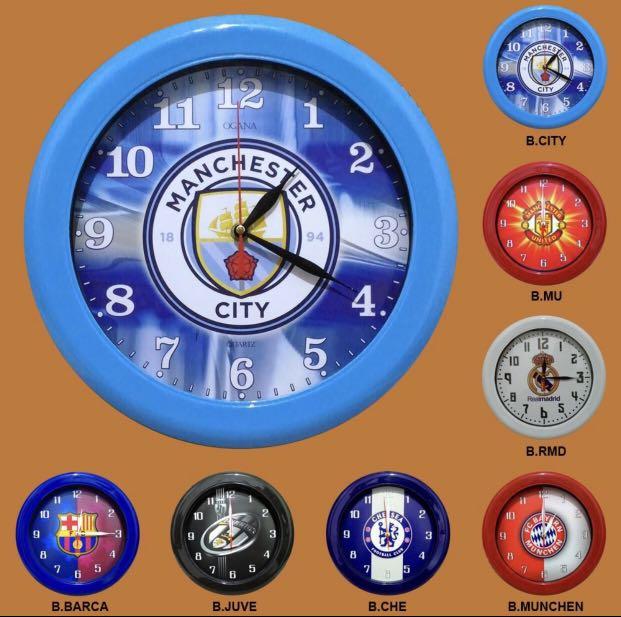 Wall Clock (Category: Everything Else) located in Singapore. Submitted by stellaraservices (Listing ID 1012655297, Image 1). Description: Diameter 30cm Teams Available: Manchester United Manchester City Chelsea Barcelona Real Madrid Juventus Bayern Munich Pre-order Item will take 2 weeks to arrive. Order only if you can wait. Payment method paynow or bank transfer. 100% Trustworthy. Collection: Meetup or Mailing *Mailing charges applies.