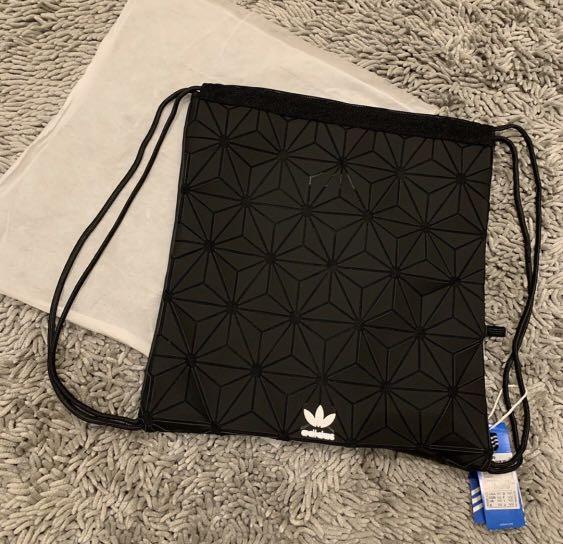Adidas issey miyake string bag shop