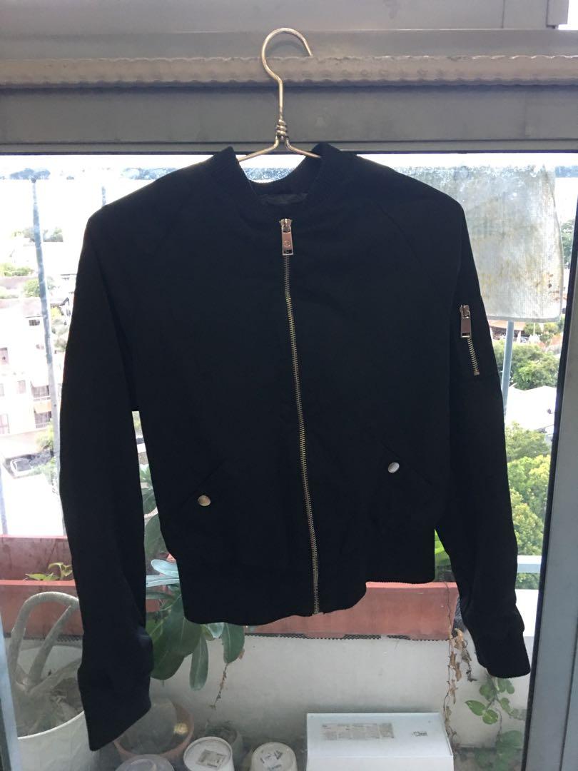 Bomber Jacket (Category: Coats, Jackets and Outerwear) located in Singapore. Submitted by nanateh (Listing ID 1012807778, Image 4). Description: Solid toned bomber jacket Stand collar neckline Lined Regular fit Zip fastening 2 pockets Cotton Bought from Cotton On Never worn before Original price was $59.95, selling at 50% off Price is negotiable, chat to nego!!.