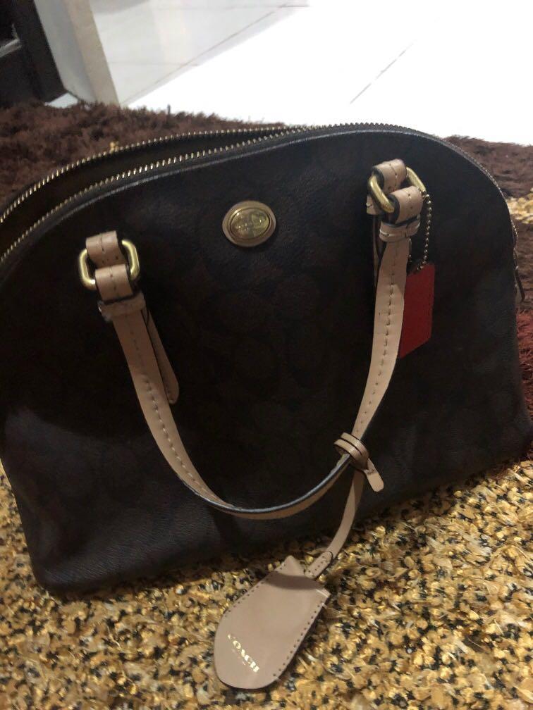 beg tangan coach