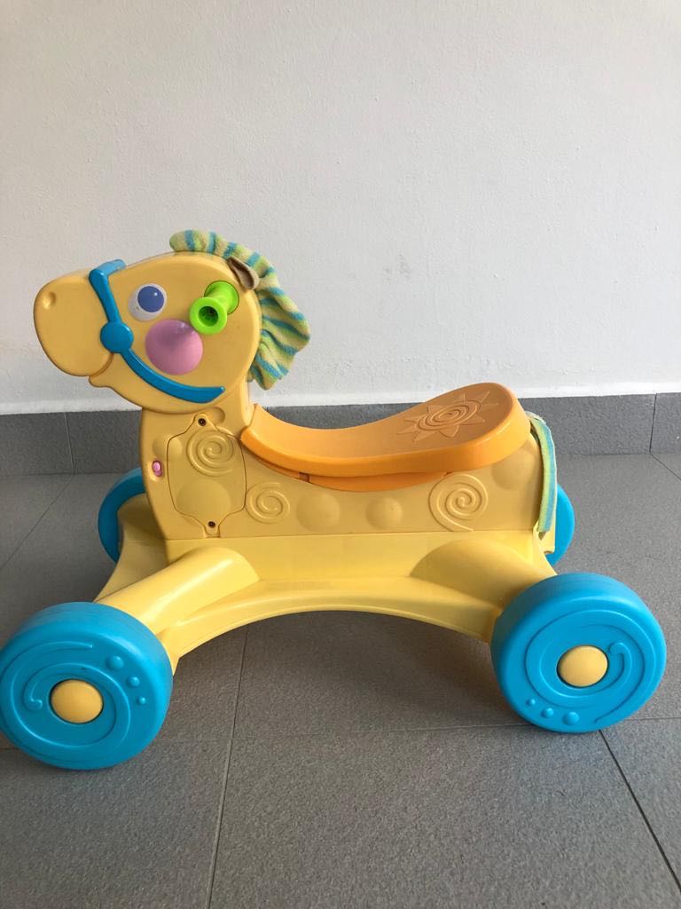 Fisher price roll along musical pony clearance