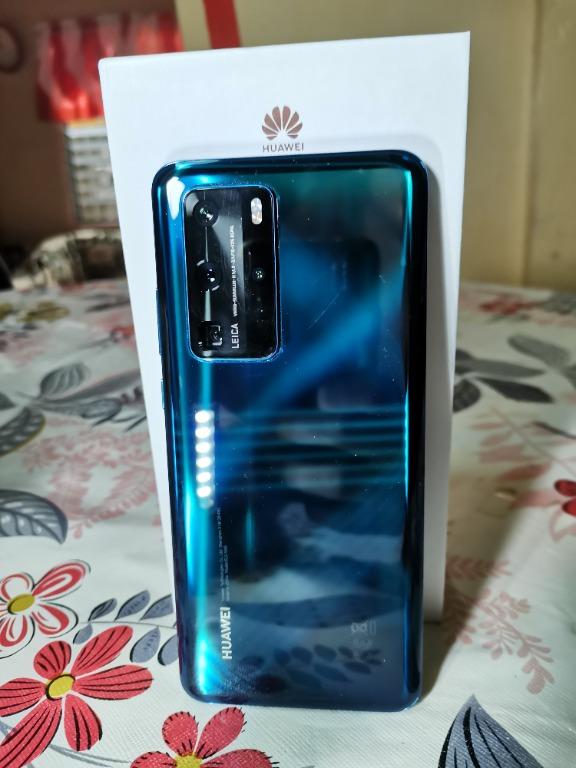 Huawei P40 Pro w/ Band 4 Smart Watch (Category: Huawei) located in Cebu City. Submitted by ralphronald (Listing ID 1012709609, Image 3). Description: Huawei P40 Pro w/ Band 4 Smart Watch * CPU- Octa-core Kirin 990 5G * EMUI 10.1 (Andriod 10) * 4200mAh Battery Capacity, Charging 40W * Rear Quad Camera w/ 50 MP Ultra Vision Camera Main Lens * Front Camera: 32 MP Selfie * Water and Dust Resistant IP68 * External Memory Support up to 256GB * Service 