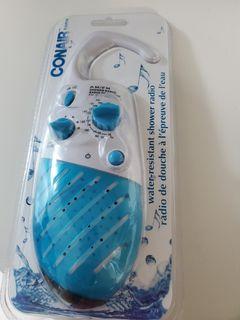 New in package. Conair water resistant shower radio
