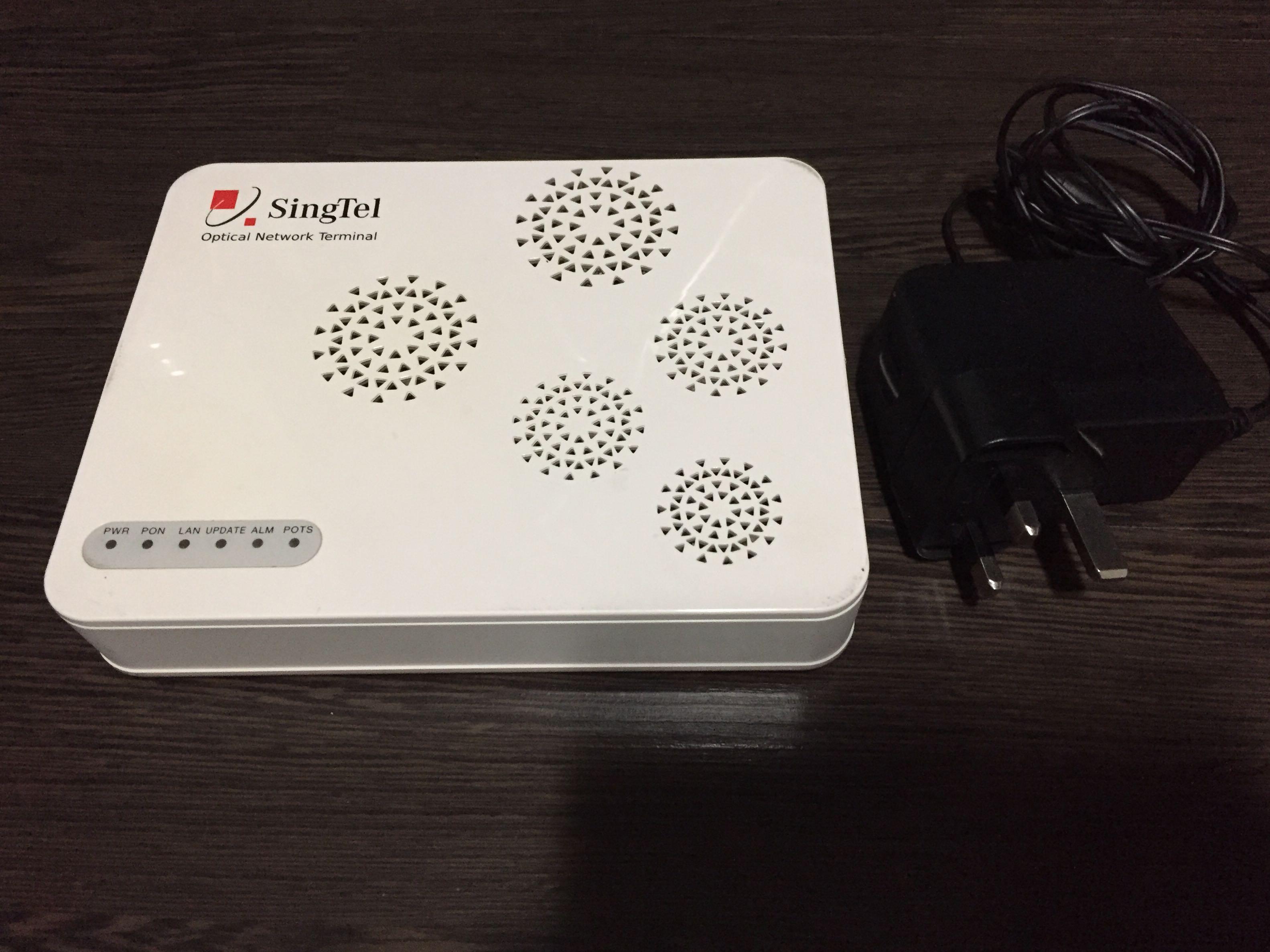 ONT (Category: Networking) located in Singapore. Submitted by crystal1888 (Listing ID 1012889152, Image 3). Description: SingTel ONT for fibre network. Excellent condition. 4 Lan port, 2 telephone RJ11 port, 1 ONT port with power adapter. Collect anytime but pls give advance notice, thanks!.