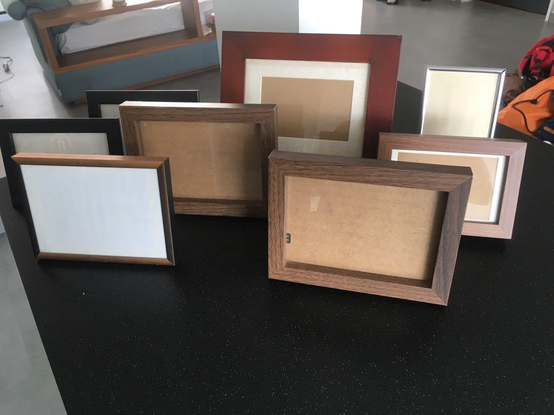 Picture frames (Category: Frames & Pictures) located in Singapore. Submitted by lpk24 (Listing ID 1012707291, Image 2). Description: What you see is what you get - 8 frames for $10 Self collect only .