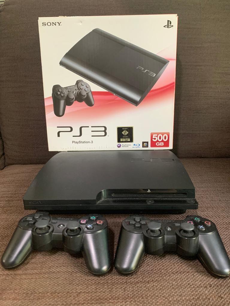 ps3 console with 2 controllers