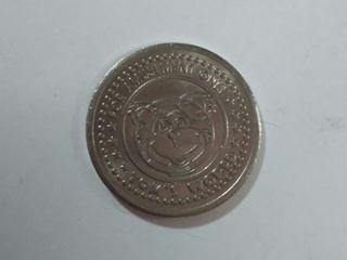 Tom's World vintage amusement token, without Philippines, scarce variety