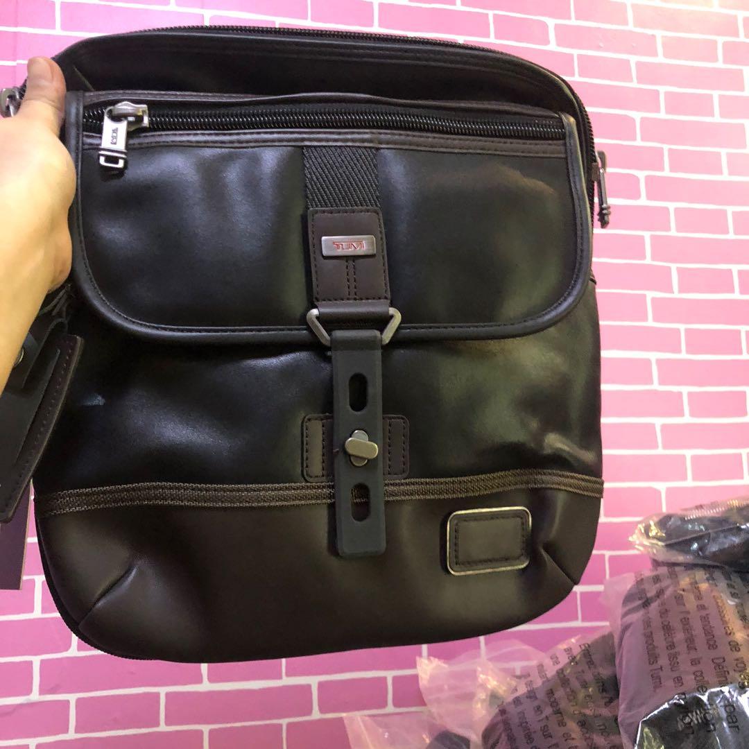 tumi sling bag leather