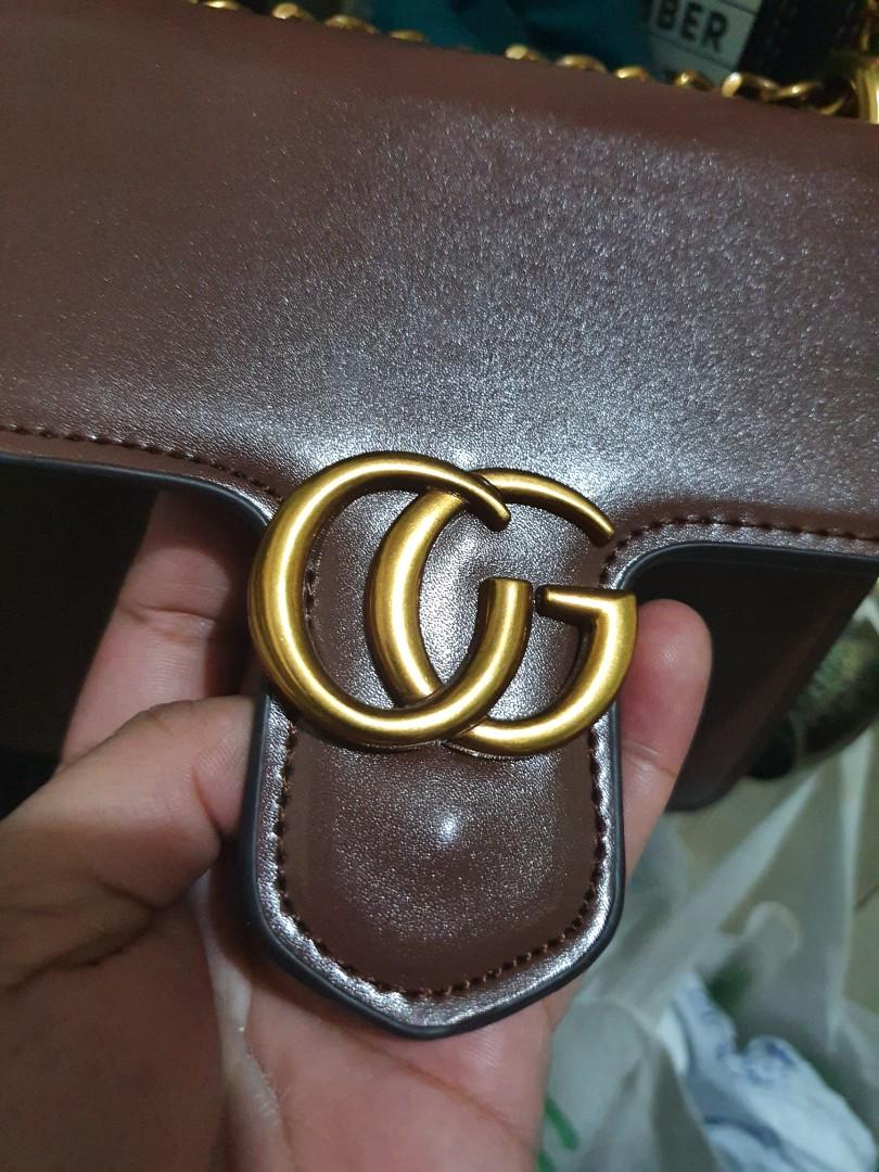 The Hidden Meaning In The Gucci GG Logo — The Outlet