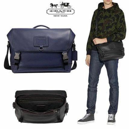 coach rivington bike bag
