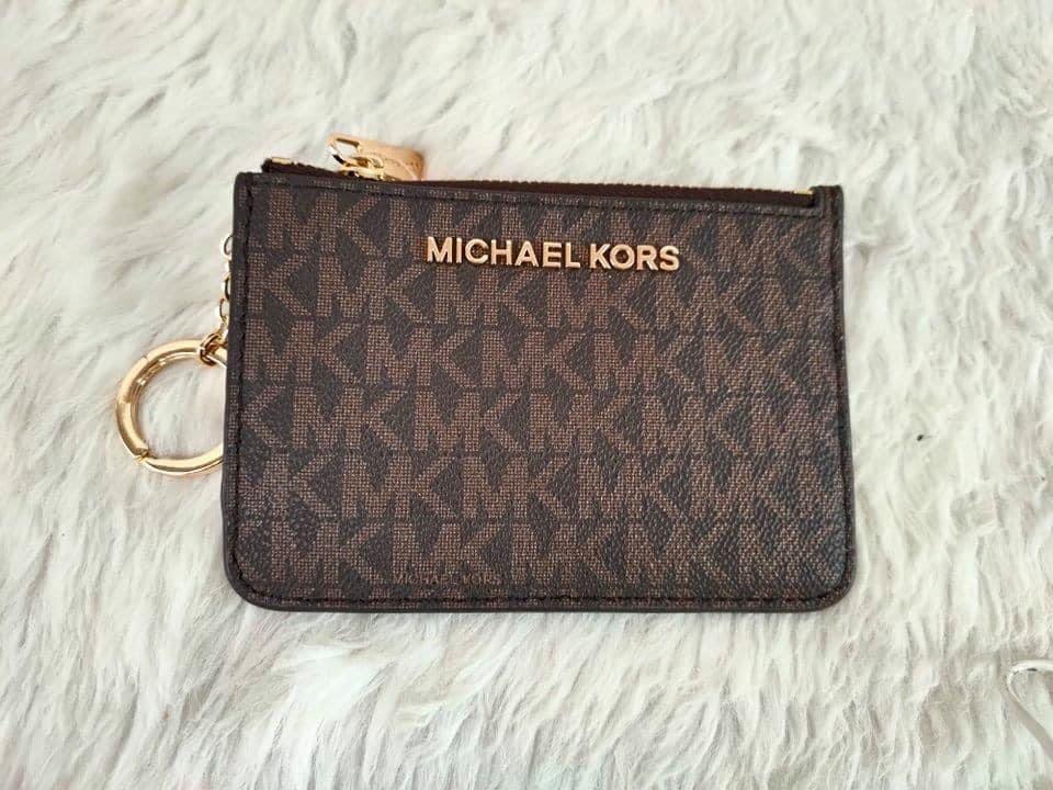 Mk wallet deals original vs fake