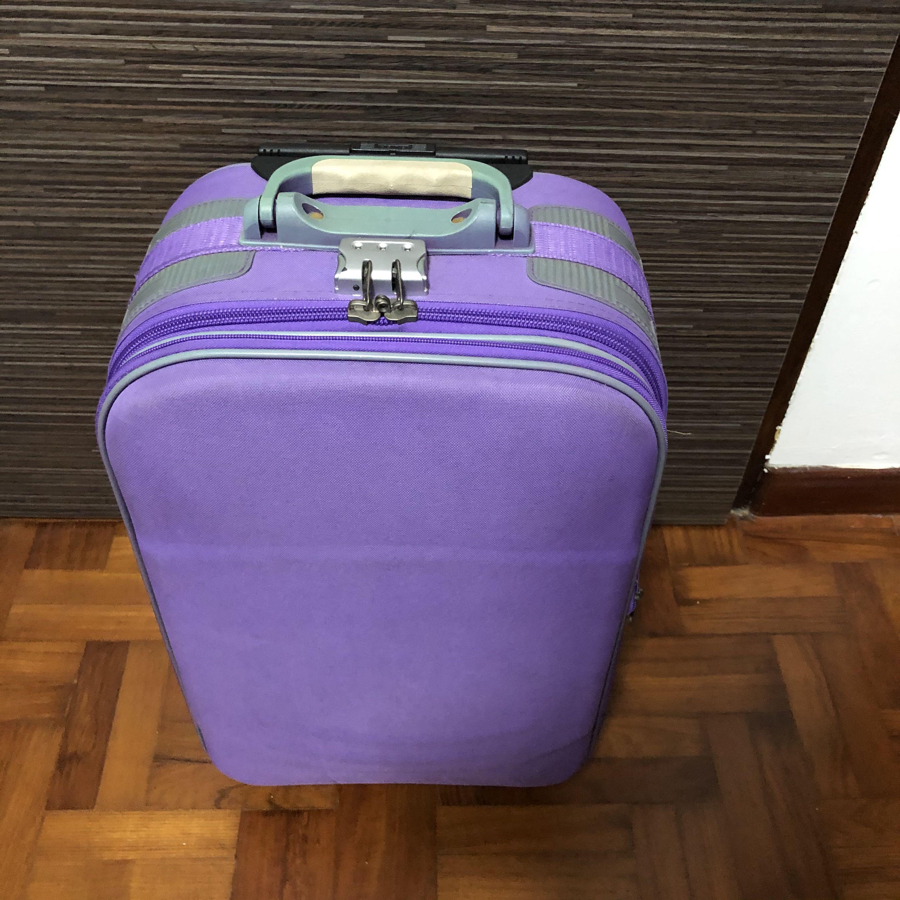 Purple luggage hotsell bag