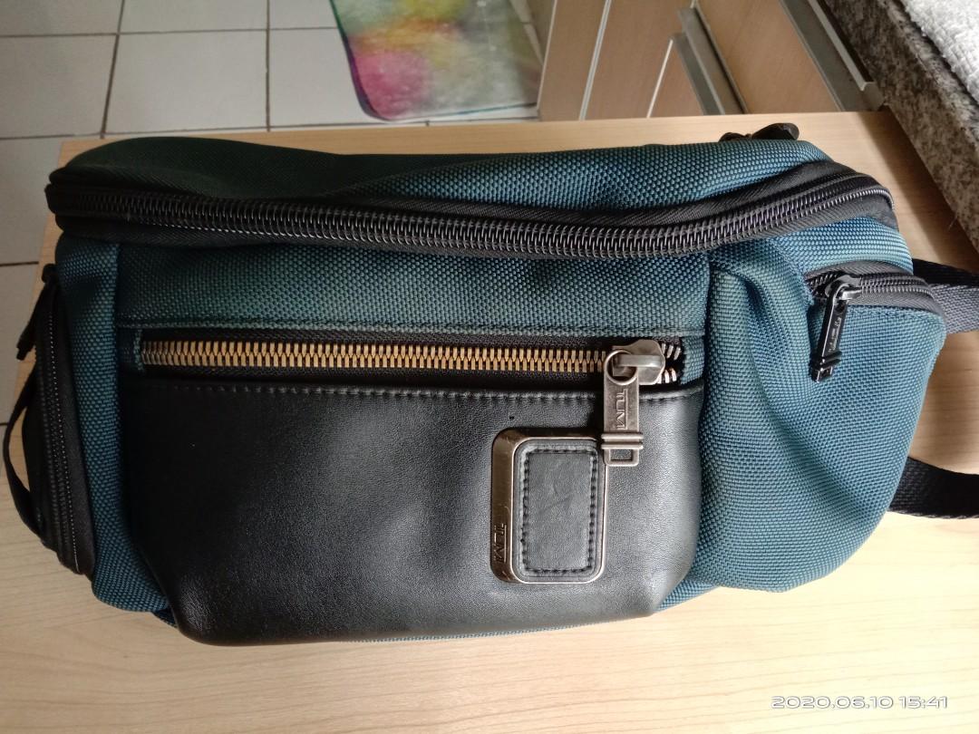 Tas merk on sale tumi original