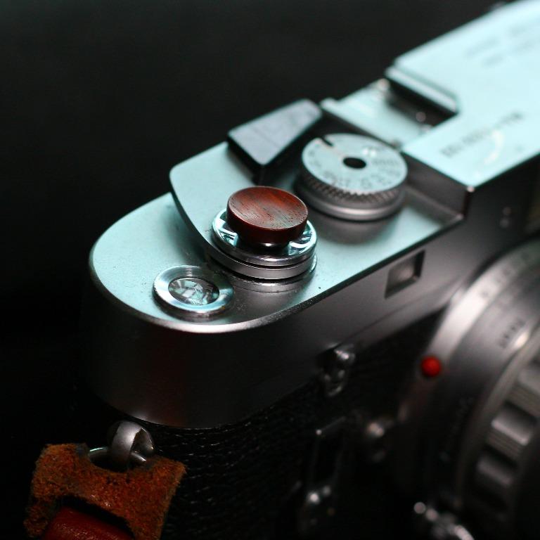 button and screw camera
