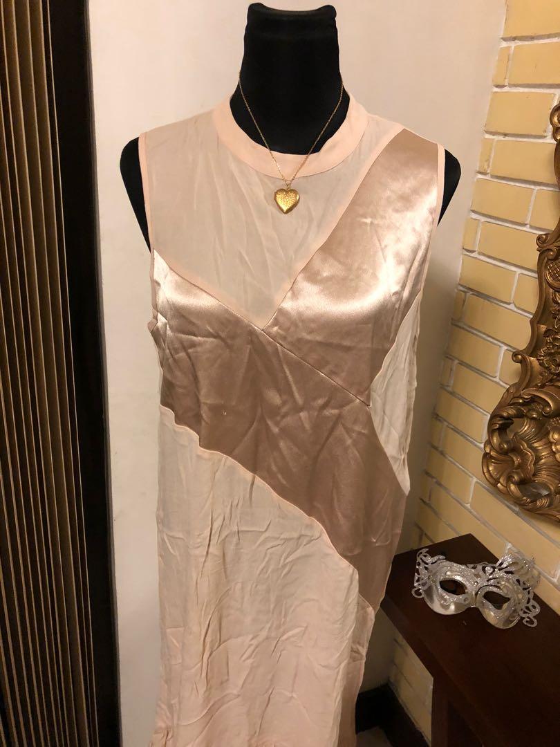 ZALORA peach midi dress (Category: Dresses) located in Pasig City. Submitted by preloved_ramen21 (Listing ID 1013341178, Image 2). Description: Brand: ZALORA color: peach size: large measurement: bust&waist: 38” length: 42” condition: used once.