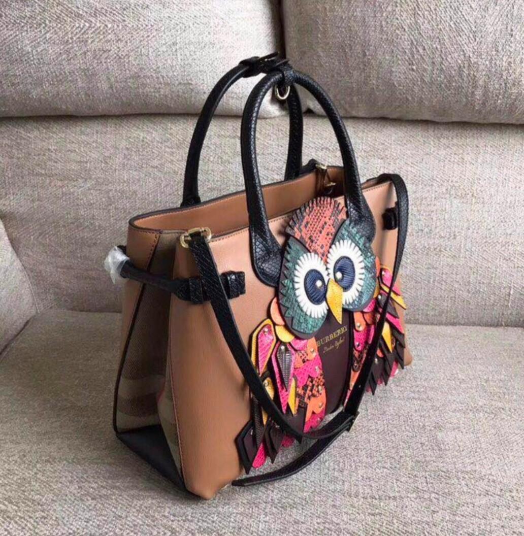 burberry owl purse Cinosural International School