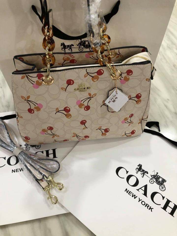 cherry coach purse