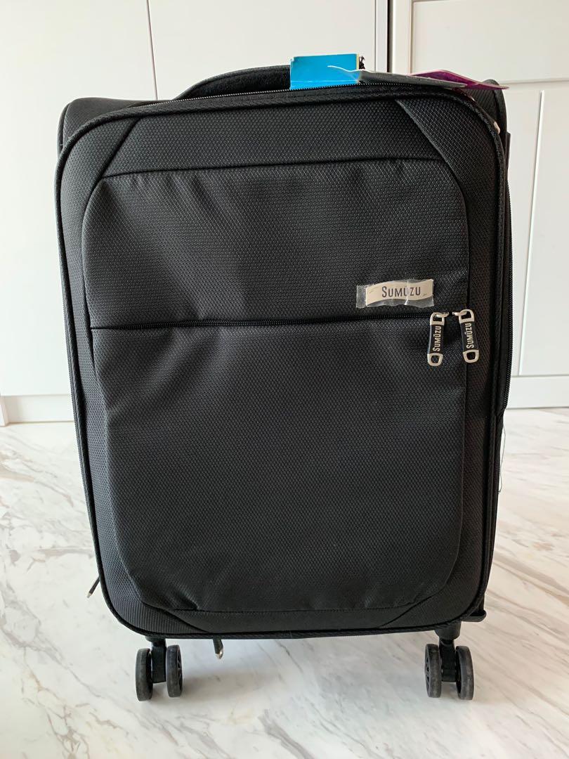 New Cabin Size Black Luggage (20”), Travel, Travel Essentials, Luggage on Carousell