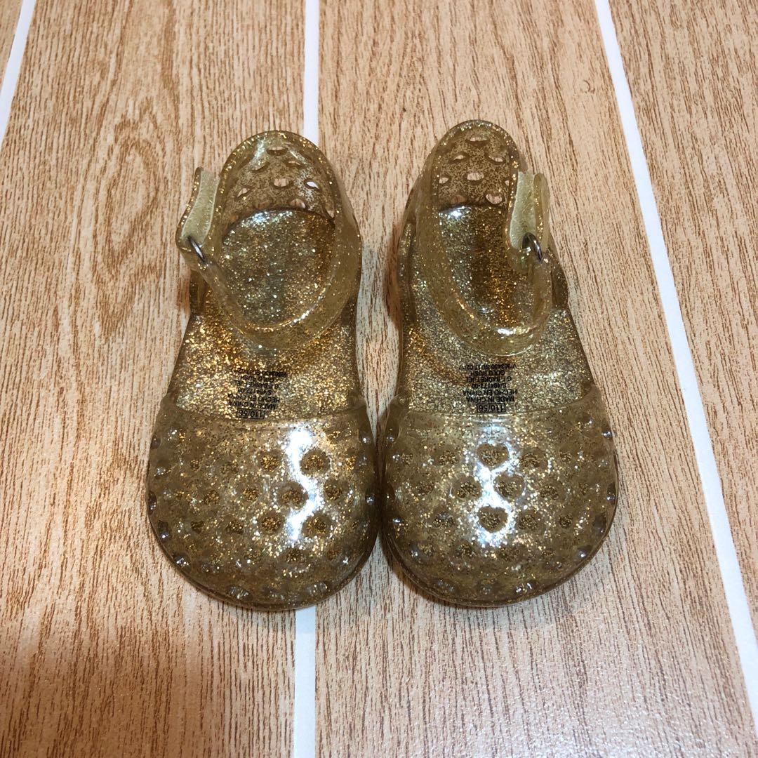 gold jelly shoes