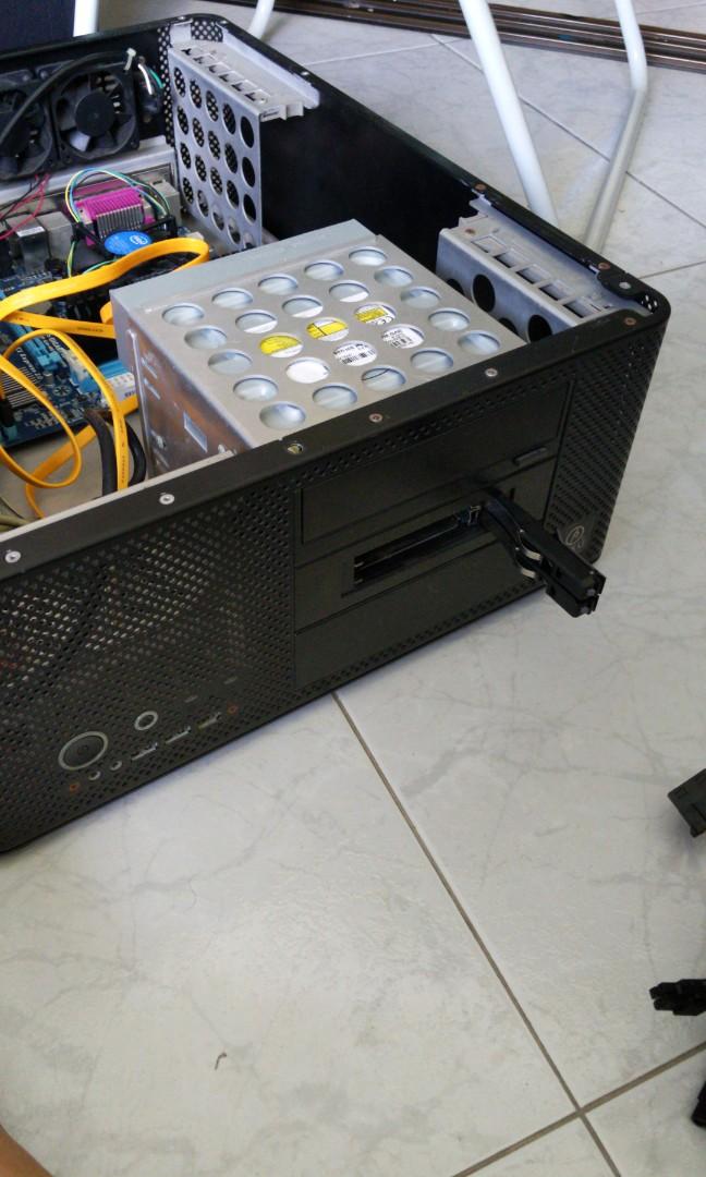 WTS old working computer (Category: Computer Parts) located in Singapore. Submitted by cheapsupps (Listing ID 1013471019, Image 1). Description: the computer consists of items as below, all are tested working 1) antec true power 430w 2) gigabyte h61m-s2ph 3) intel celeron 1610T 4) Samsung dvd writer 5) Corsair 8gb ram 6)Seagate sshd 500gb 9) 3.5 to 2.5 HDD cage 10) Lian li htpc chassis.