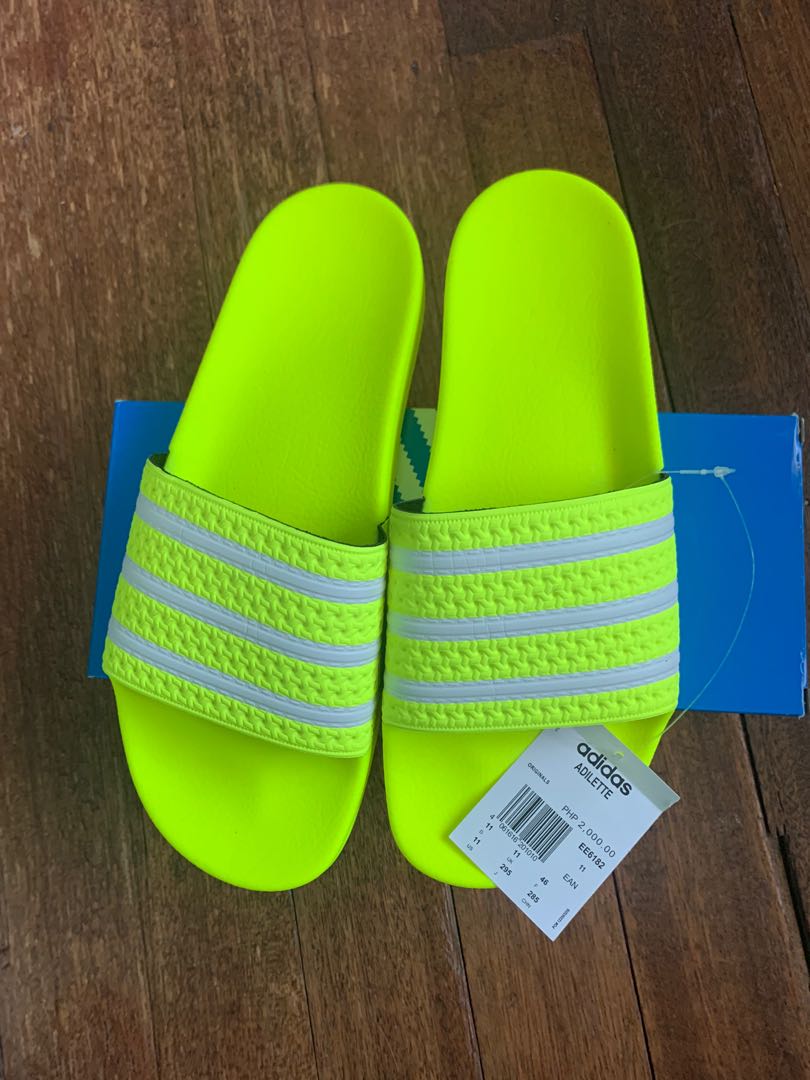 neon green adidas slides