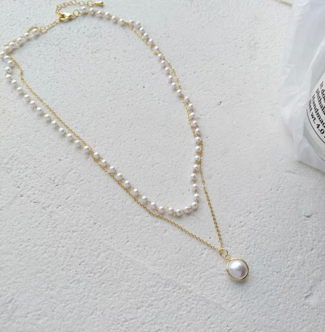 Chain with pearl pendant outlet