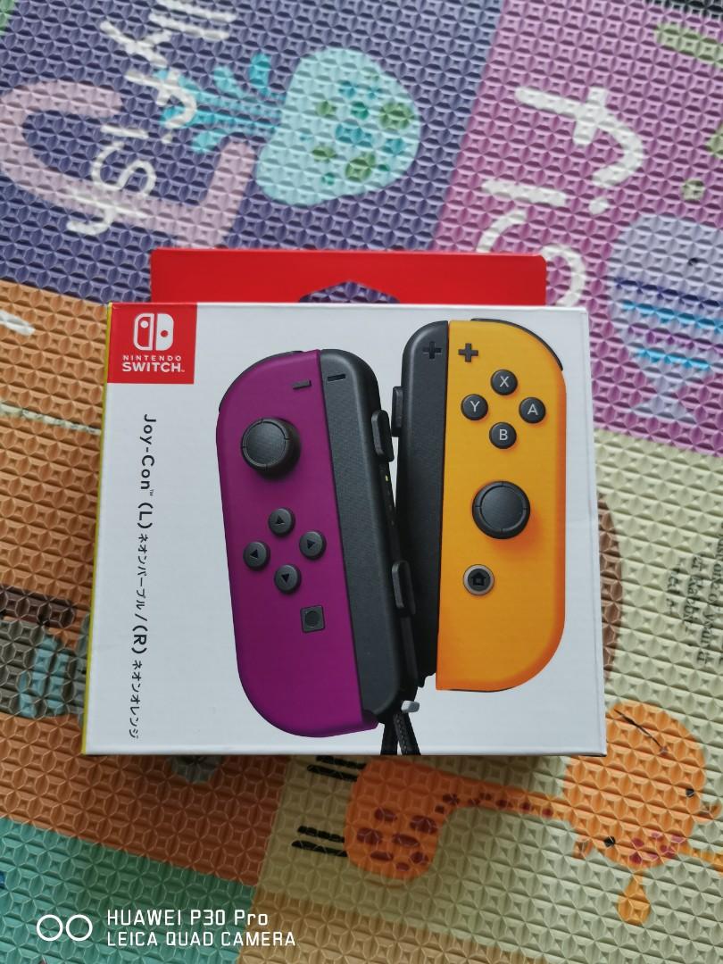 Joy Con Neon Purple Orange For Nintendo Switch Video Gaming Video Game Consoles Nintendo On Carousell