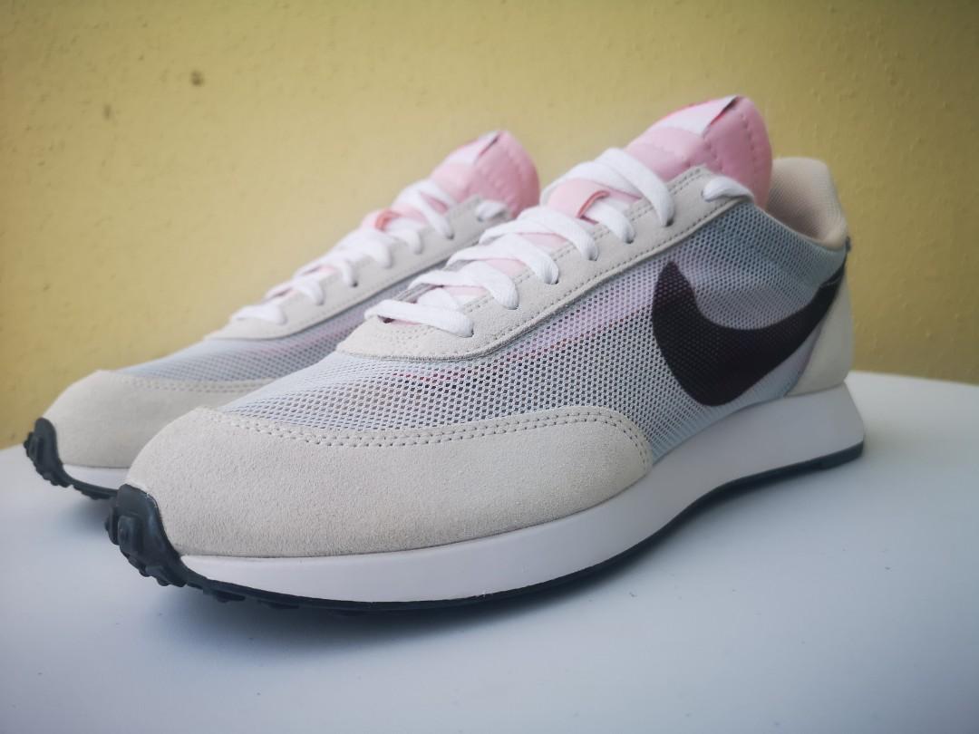 Nike tailwind be true top