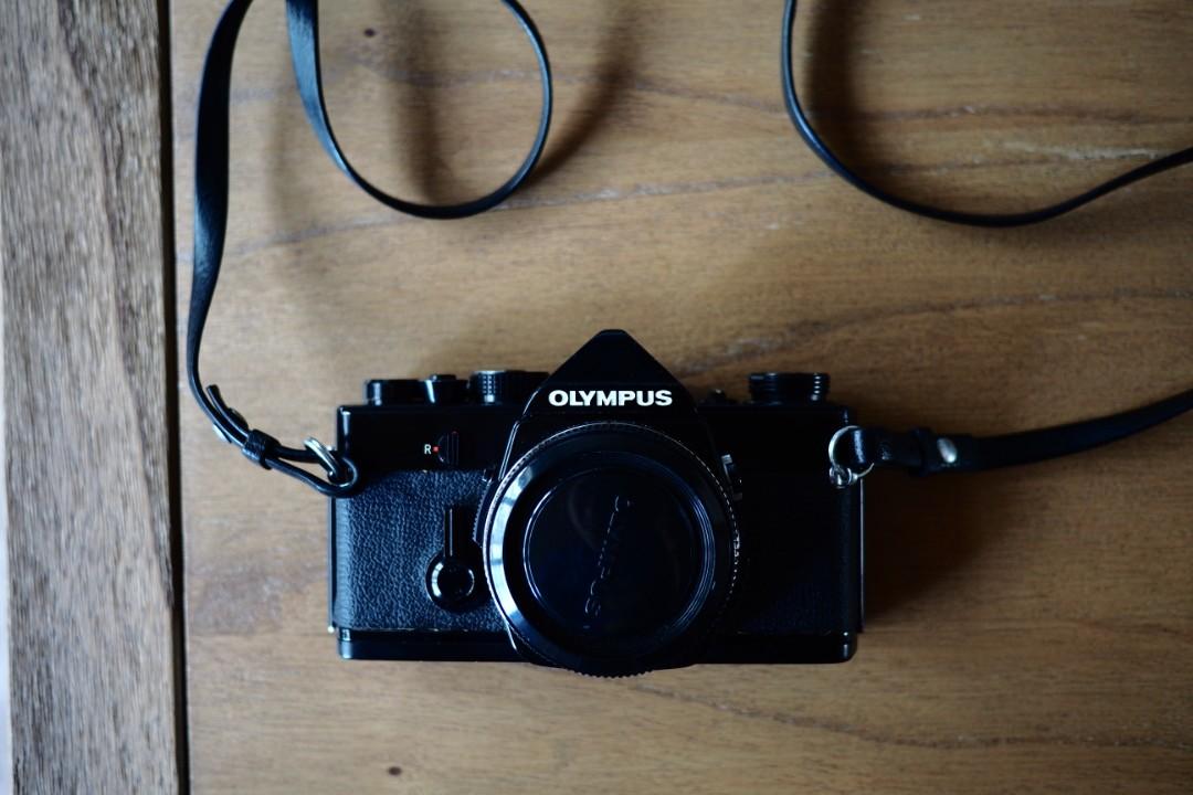 Olympus OM1 film camera black, Photography, Cameras, DSLR on Carousell