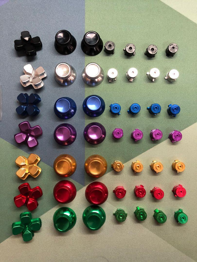 Ps4 controller metal button (Category: Controllers) located in Singapore. Submitted by arthurjing (Listing ID 229674366, Image 1). Description: Metal button for ps4 controller, 7 colours available, deal at Hougang, normal mail $2, q delivery $5.
