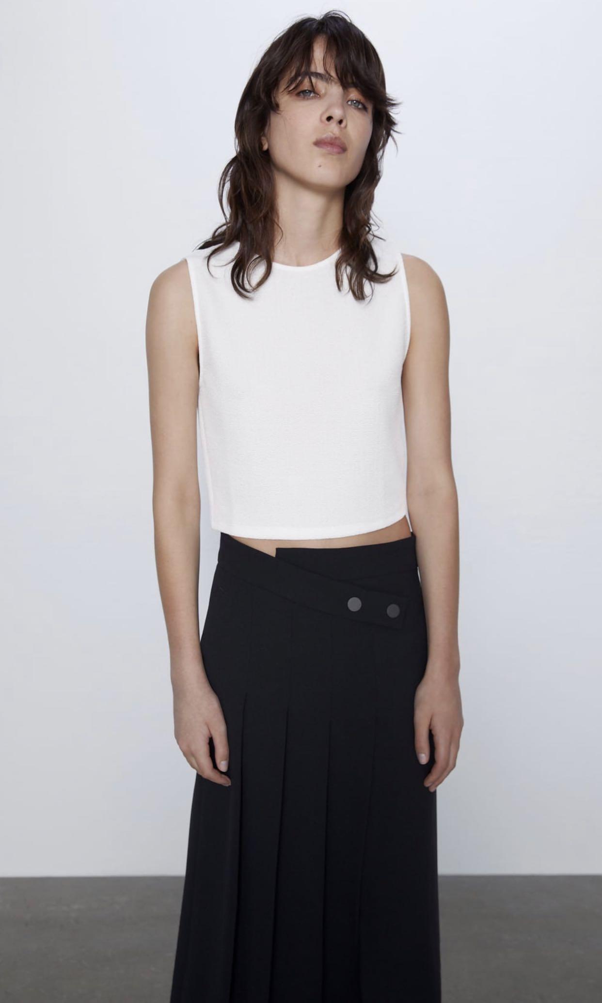 BNWT Zara textured crop top (Category: Sleeveless) located in Makati City. Submitted by madclutter (Listing ID 1014098241, Image 1). Description: Brand new with tag! Selling 50% off from original price!.