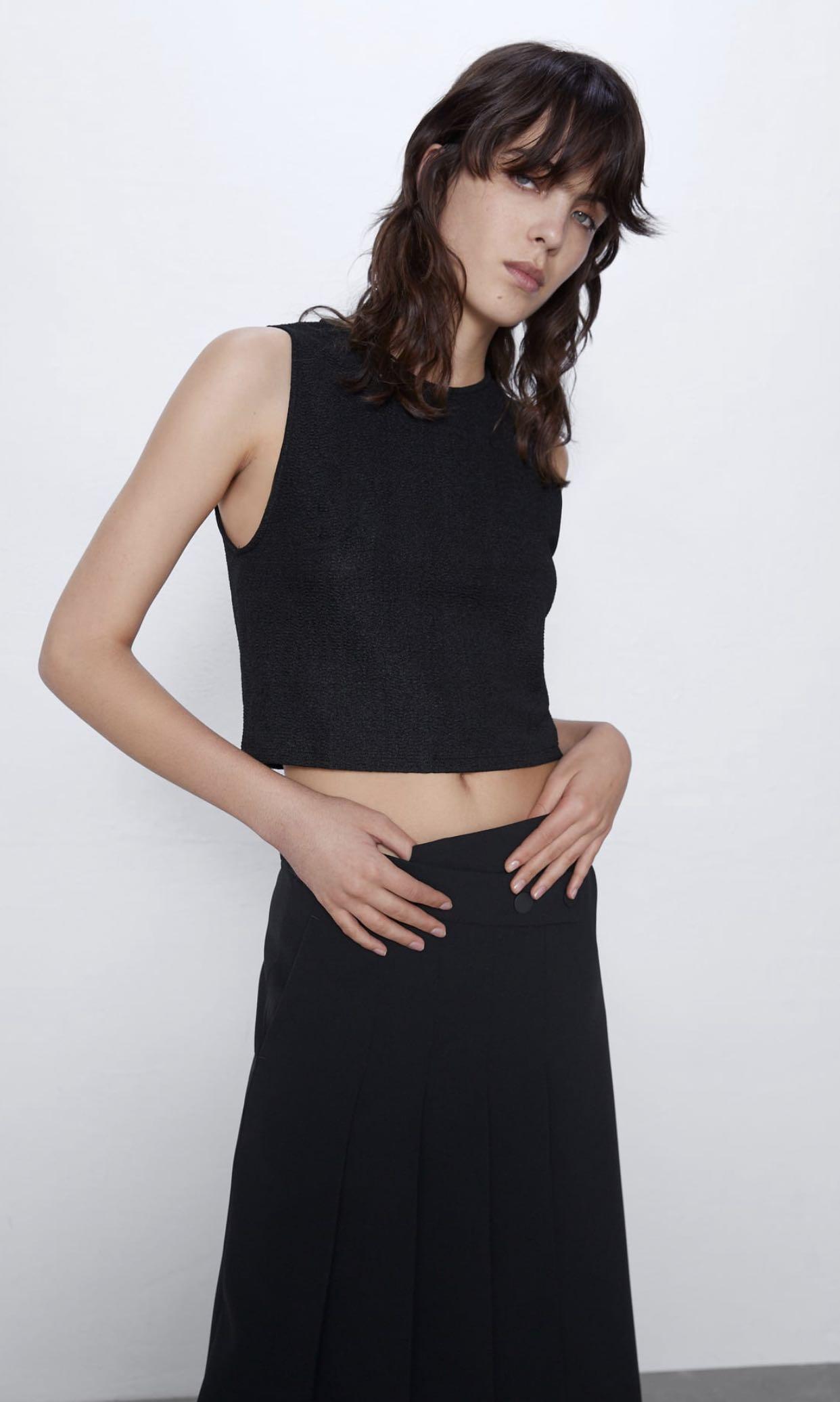 BNWT Zara textured crop top (Category: Sleeveless) located in Makati City. Submitted by madclutter (Listing ID 1014098295, Image 1). Description: Brand new with tag! Selling 50% off from original price!.