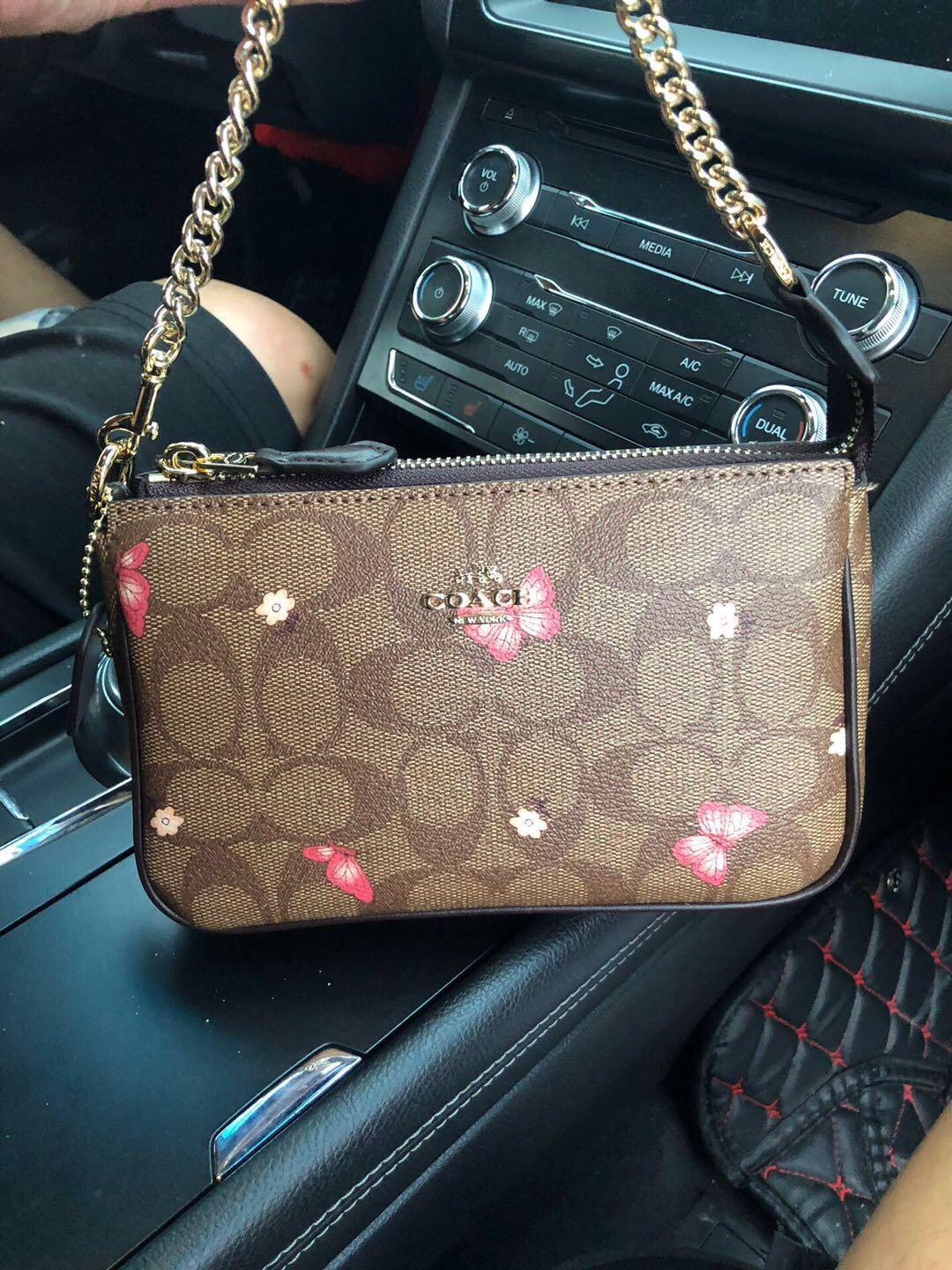 Coach store butterfly wristlet
