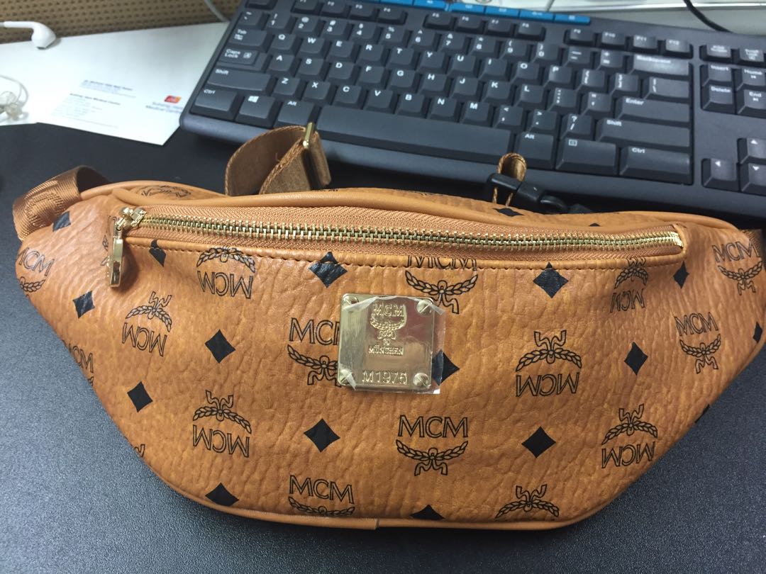Mcm sales pouch mens