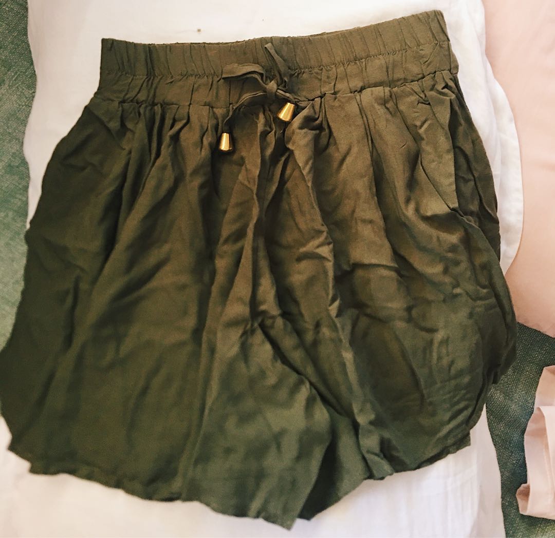 green flowy shorts