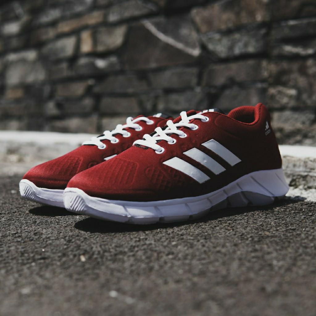 red and grey adidas shoes