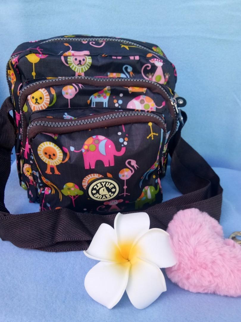 sling bag with multiple pockets