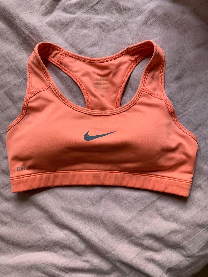 neon orange nike sports bra