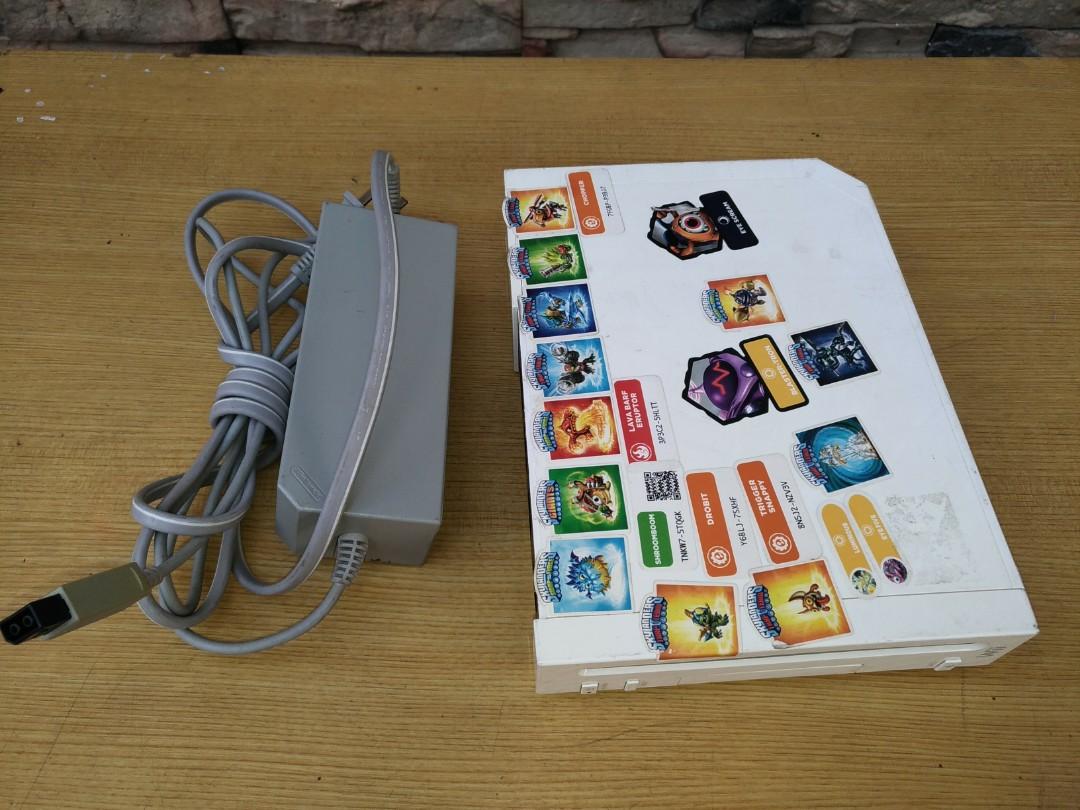 Nintendo Wii Console (Category: Nintendo) located in Manila. Submitted by vintagepopsicle (Listing ID 1014235241, Image 1). Description: Nintendo Wii Console with Power Supply and Controller. This was playable before but the CDs and the AV Cable are missing. Although it should still be playable because we can sync the controller as you can see from the photos. The controller can turn off the console when in sync. Please note the photos as they ar