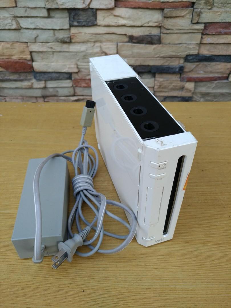 Nintendo Wii Console (Category: Nintendo) located in Manila. Submitted by vintagepopsicle (Listing ID 1014235241, Image 2). Description: Nintendo Wii Console with Power Supply and Controller. This was playable before but the CDs and the AV Cable are missing. Although it should still be playable because we can sync the controller as you can see from the photos. The controller can turn off the console when in sync. Please note the photos as they ar